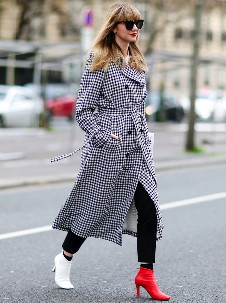 PARIS, FRANCE - MARCH 07: Lisa Aiken wears a checked trench coat, a red shoes, and a white shoe, outside the Ellery show, during Paris Fashion Week Womenswear Fall/Winter 2017/2018, on March 7, 2017 in Paris, France. (Photo by Edward Berthelot/Getty Images)